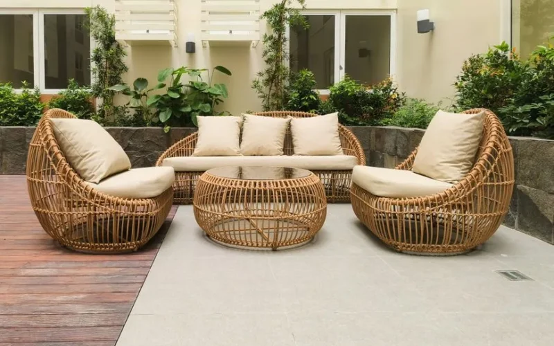 Modern outdoor rattan furniture set on a stylish terrace in Manila, Philippines.