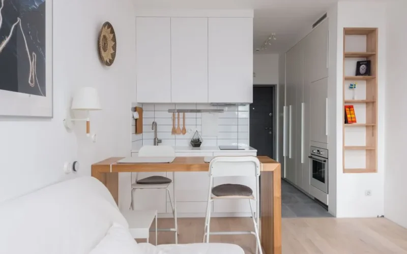 Ergonomia stołu w małym salonie z aneksem - 5 kluczowych wymiarów